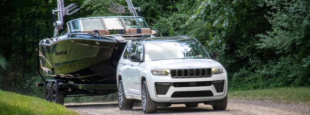 2026 Jeep Grand Cherokee pulling boat