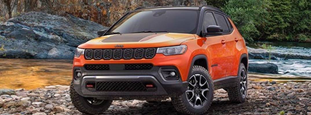 2026 Jeep Compass parked on rocky terrain. 