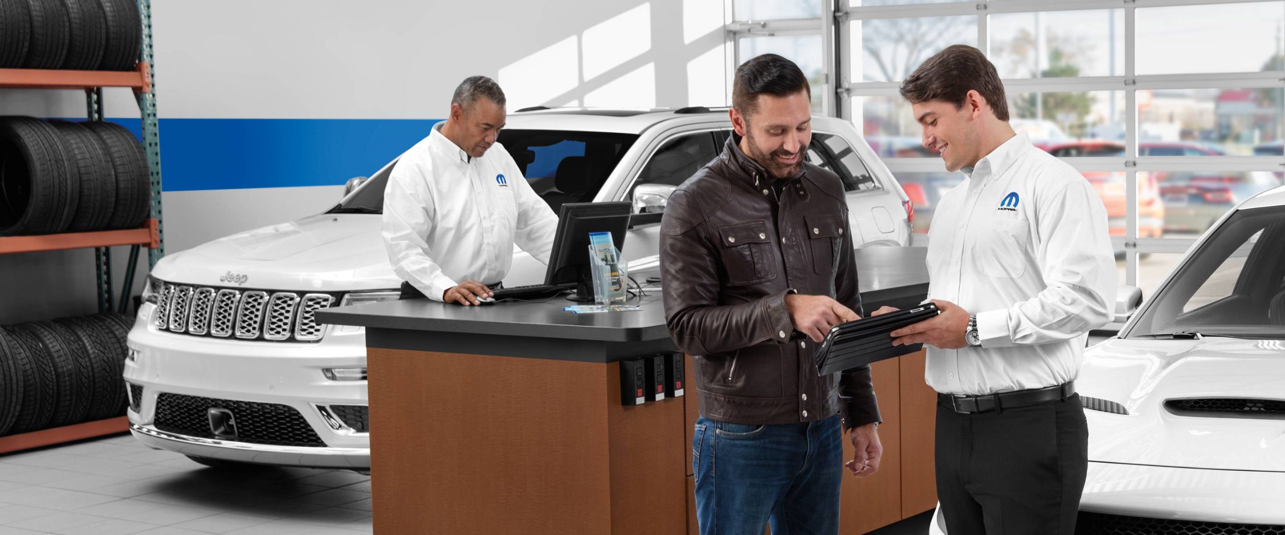 Unknown person speaking with employee